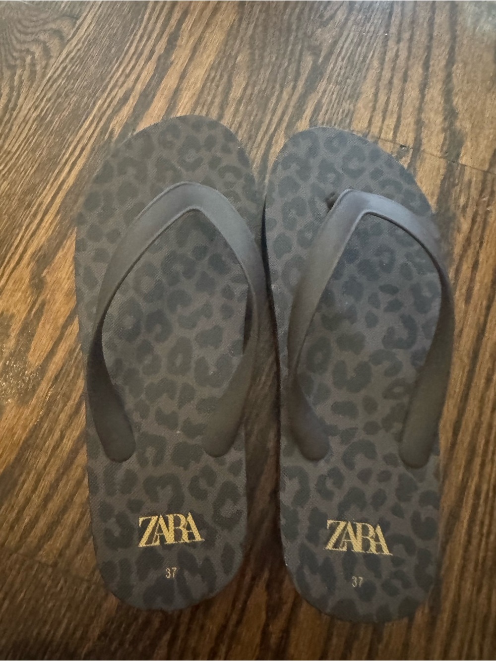 ZARA Black Leopard Print Flip Sandals with Gold Logo
